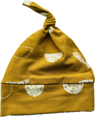 Sun/moon mustard knotted beanie